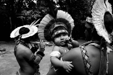 porto seguro, bahia / brazil - april 13, 2006: Pataxo Indians are seen in the Jaqueira village in the city of Porto Seguro, in southern Bahia. clipart