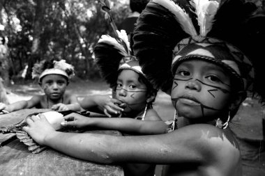 porto seguro, bahia / brazil - april 13, 2006: Pataxo Indians are seen in the Jaqueira village in the city of Porto Seguro, in southern Bahia. clipart