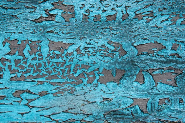 Mavi Metal Bir Yüzey Üzerinde Çatlak Siyah Boya — Stok fotoğraf