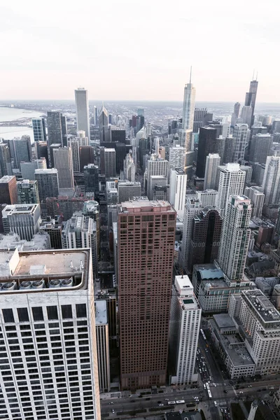 Chicago. Aerial view of Chicago downtown from high above. Superimposed cold tone filter. vertical layout — Stock Photo, Image