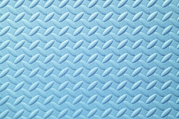 new blue crawling foam pad or cyan color rubber floor and male soft board on top view for baby or children boy and kid protect to play on playground and for texture or background with man wallpaper