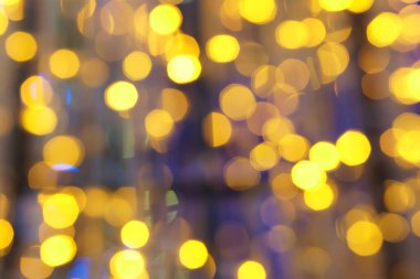 Özet olarak, arka plan ve noel festivali için gece partisinden çıkarılmış altın bokeh ya da baloncuk
