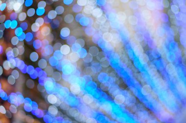 Özet olarak, arka plan ve noel festivali için gece ışık partisinden çıkarılmış mavi bokeh veya baloncuk