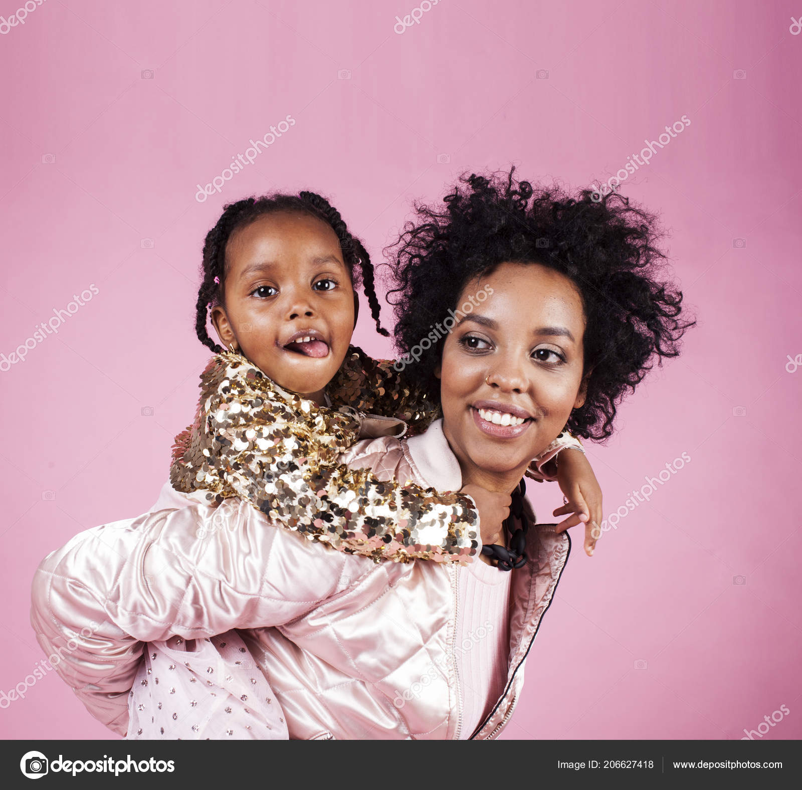 Young Pretty African American Mother With Little Cute