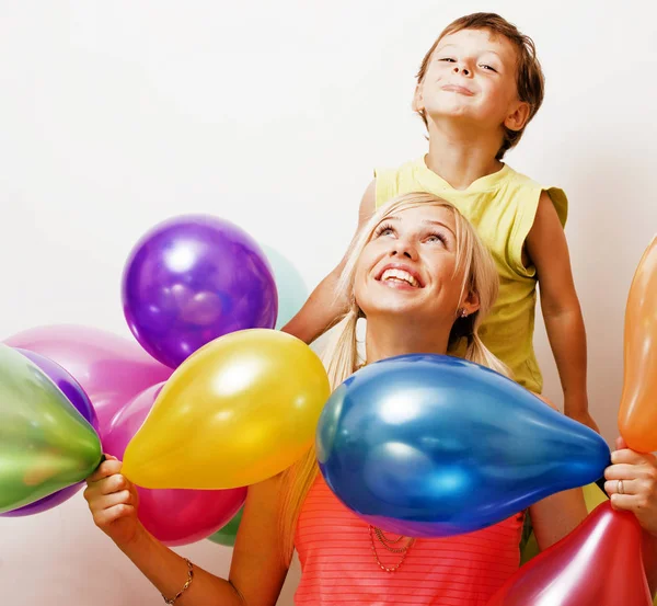 pretty real family with color balloons on white background, blon