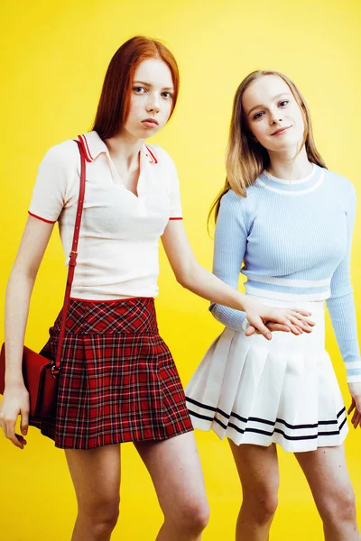 lifestyle people concept: two pretty young school teenage girls