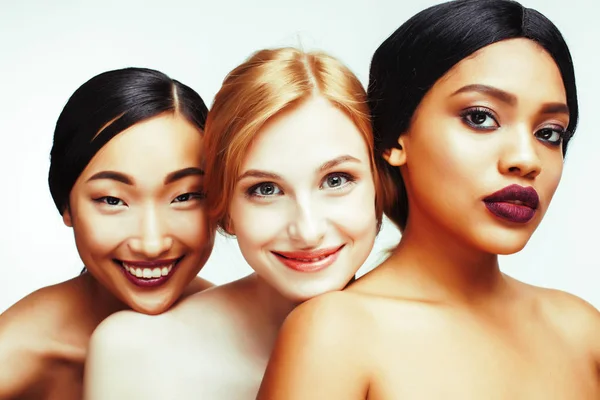 different nation woman: asian, african-american, caucasian toget