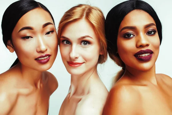 different nation woman: asian, african-american, caucasian toget