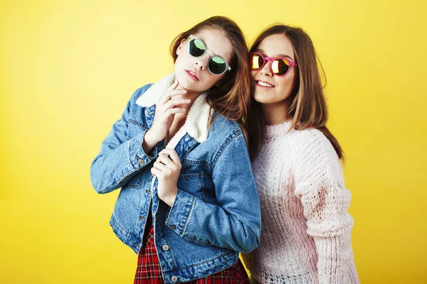 lifestyle people concept: two pretty young school teenage girls