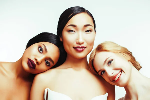 different nation woman: asian, african-american, caucasian together isolated on white background happy smiling, diverse type on skin, lifestyle people concept close up