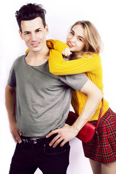 best friends teenage couple girl and boy together having fun, posing emotional on white background, couple happy smiling, lifestyle people concept, blond and brunette