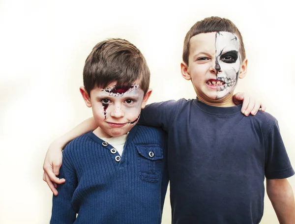 zombie apocalypse kids concept. Birthday party celebration facepaint on children dead bride, scar face, skeleton together having fun, halloween people