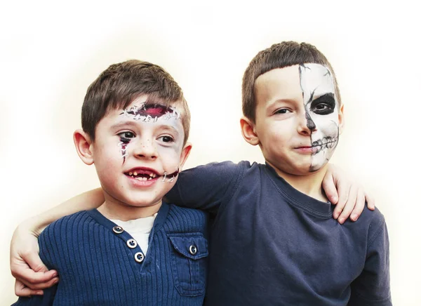 zombie apocalypse kids concept. Birthday party celebration facepaint on children dead bride, scar face, skeleton together having fun, halloween people