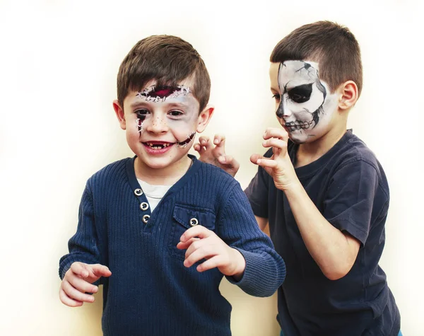 zombie apocalypse kids concept. Birthday party celebration facepaint on children dead bride, scar face, skeleton together having fun, halloween people