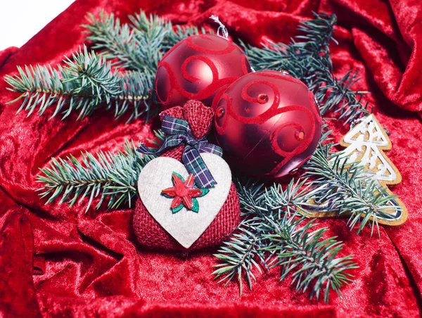 christmas decoration on red background for post card greetings, toy design on tree macro xmas, ball and drum