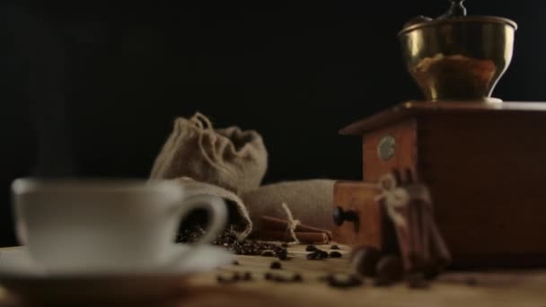 Scene twist with focusing on central modern coffee cup.From tradition to present — Stock Video
