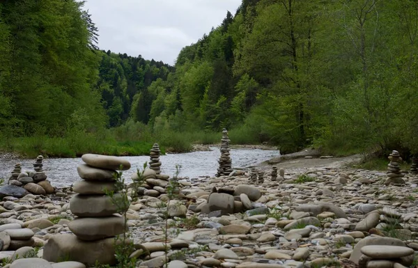 Meditative stone art at wild river — Stock Image Meditative stone art at wild river Stock Picture