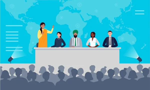 International press conference concept. A multiethnic group of people is sitting at the desk on stage. An Indian woman has a speech to the audience. Flat vector illustration. — Stock Vector