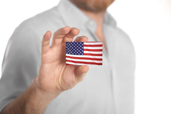 Businessman holding business card with USA flag — Stock Photo, Image