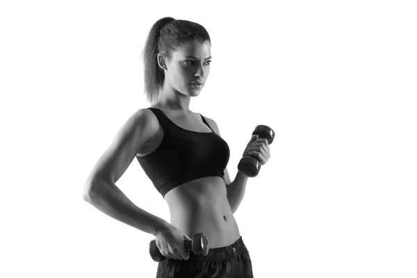 Bonito exercício jovem mulher com halteres — Fotografia de Stock