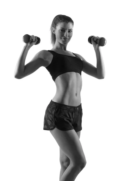 Beautiful young woman exercise with dumbbells — Stock Photo, Image