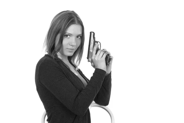 Schönes Mädchen mit Pistole — Stockfoto