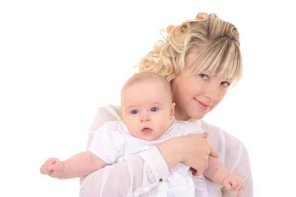 Fröhlich schöne junge Frau hält Baby in den Händen — Stockfoto