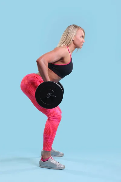 Fitness ung flicka gör övningar — Stockfoto