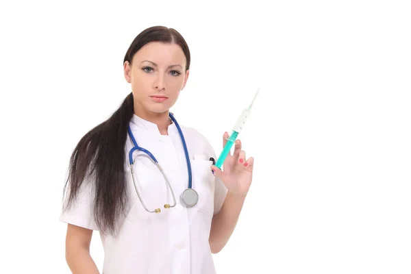 Ung flicka sjuksköterska med en spruta — Stockfoto