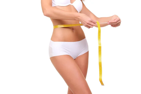Mulher medindo seu corpo magro — Fotografia de Stock