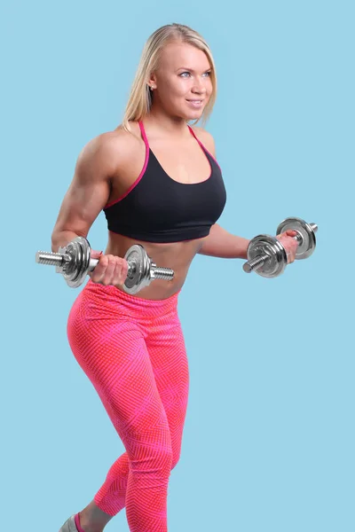 Chica joven de fitness haciendo ejercicios —  Fotos de Stock