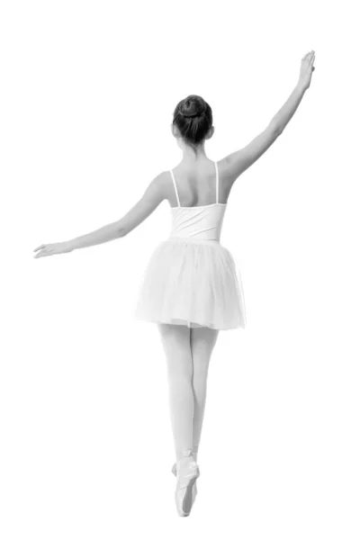 Jong meisje ballerina poseren op witte achtergrond — Stockfoto
