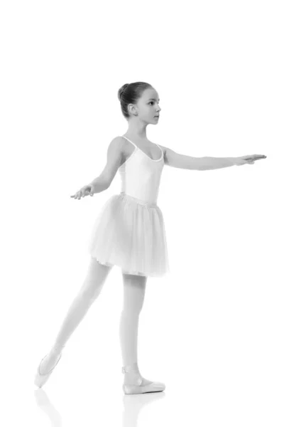 Young girl ballerina posing on white background — Stock Photo, Image