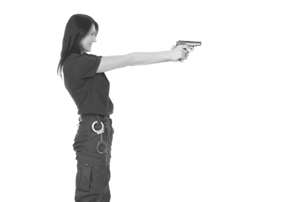 Young police girl with gun — Stock Photo, Image