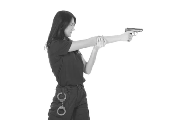 Young police girl with gun — Stock Photo, Image