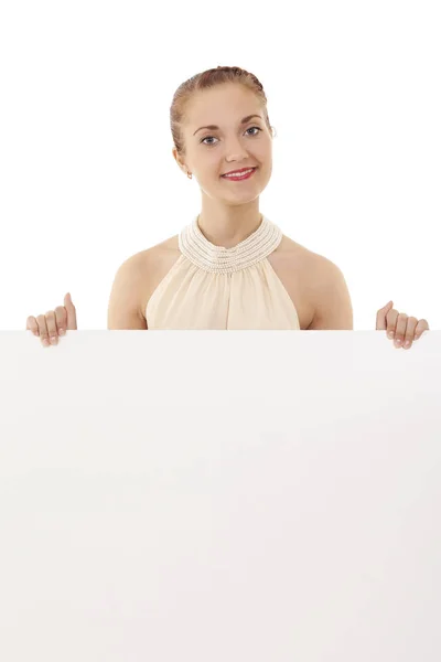 Mujer joven con letrero en blanco, sobre blanco — Foto de Stock