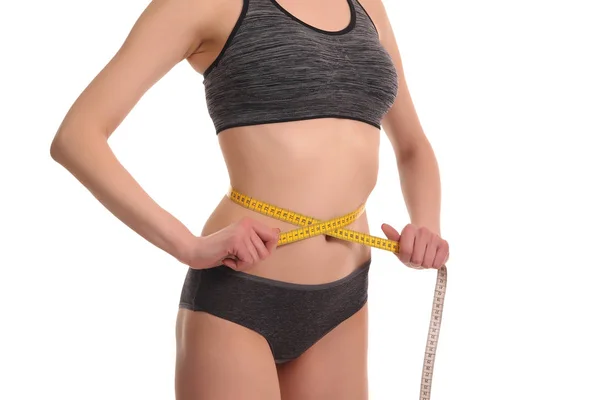 Woman measuring her slim body — Stock Photo, Image