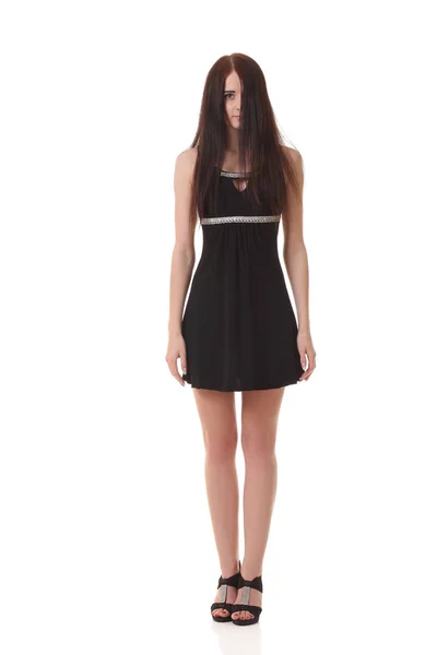 Ung flicka i svart liten klänning — Stockfoto