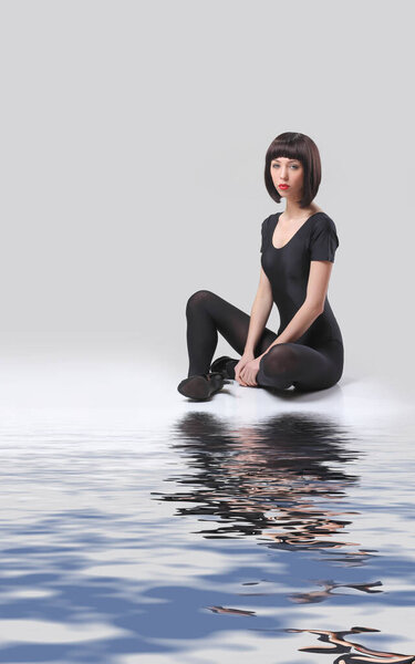 Beautiful woman with long sexy legs in pantyhose