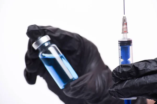 Mano Del Médico Sostiene Una Ampolla Con Líquido Azul Una —  Fotos de Stock