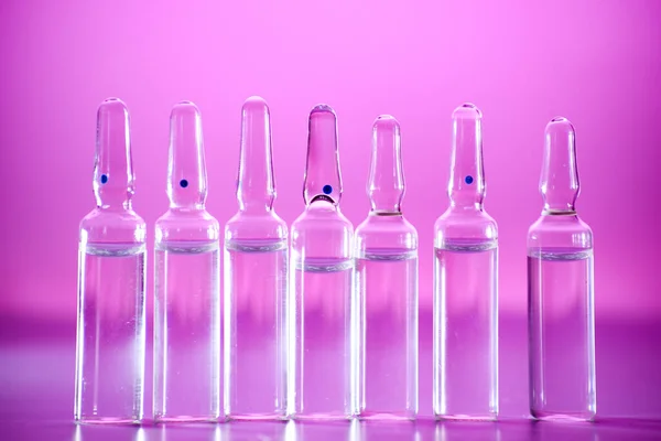 Glass Medicine Ampoules Pink Background Close — Stock Photo, Image