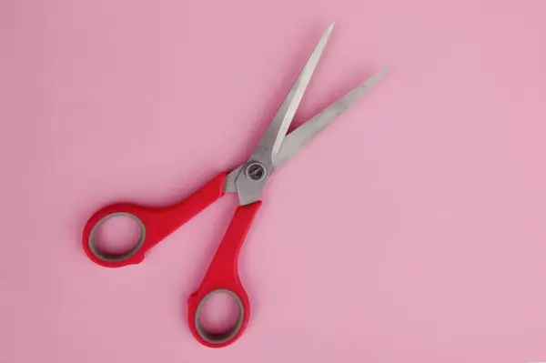 One Pair Scissors Pink Handles Pink Bed Background — Stock Photo, Image