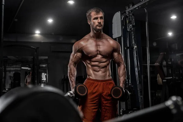 Waist up portrait of furious guy showing courage during training