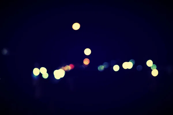 Abstract urban night light bokeh, defocused background — Stock Photo, Image