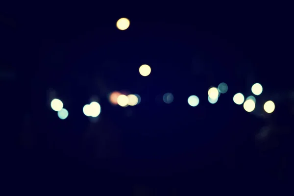 Astratto urbano notte luce bokeh, sfondo sfocato — Foto Stock