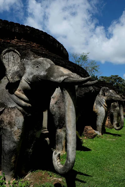 Stone Elephant Statues Base of Stupa at \