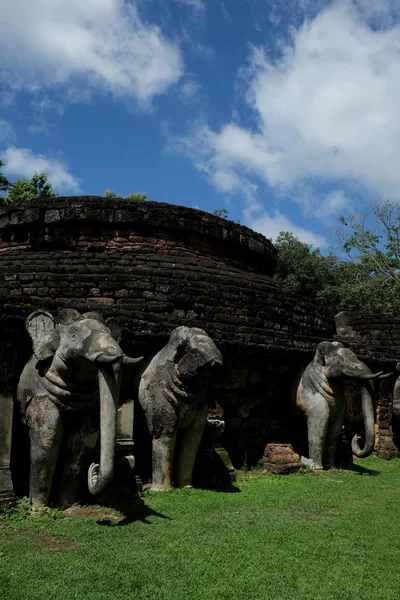 Stone Elephant Statues Base of Stupa at \