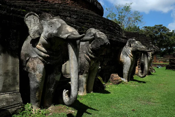 Stone Elephant Statues Base of Stupa at 