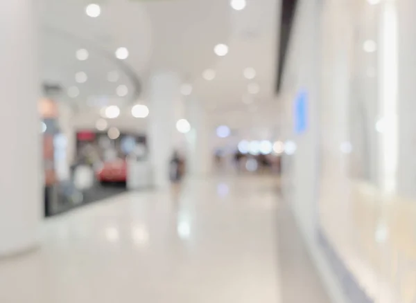 Imagem turva de shopping center e pessoas, em loja de departamento — Fotografia de Stock