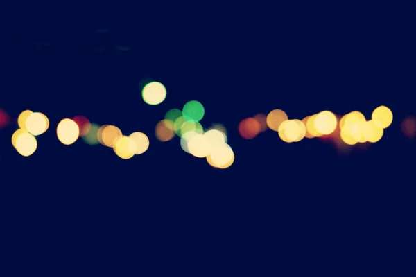 Abstract urban night light bokeh, defocused background — Stock Photo, Image